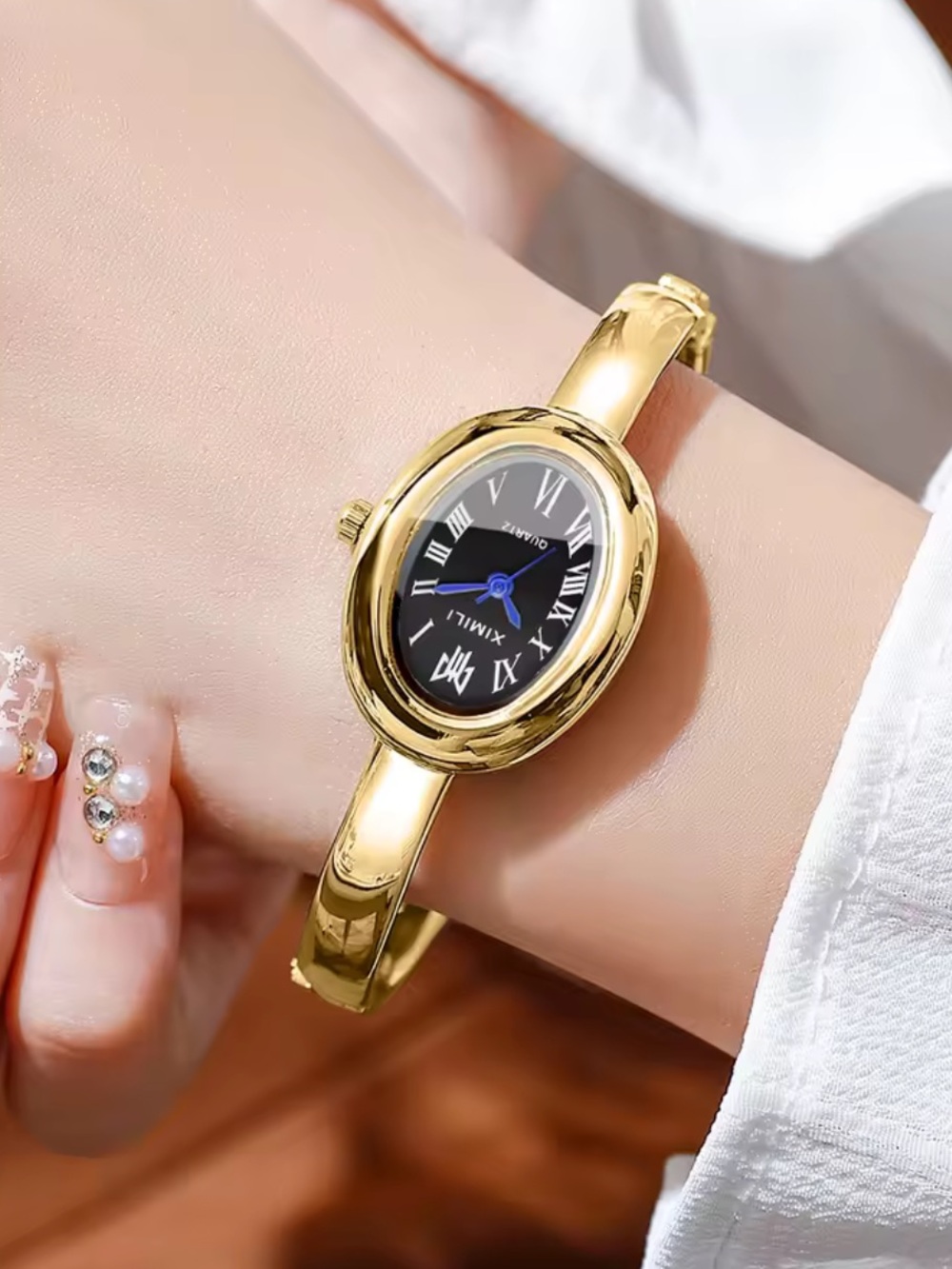 Elegant Gold-Tone Stainless Steel Bangle Watch